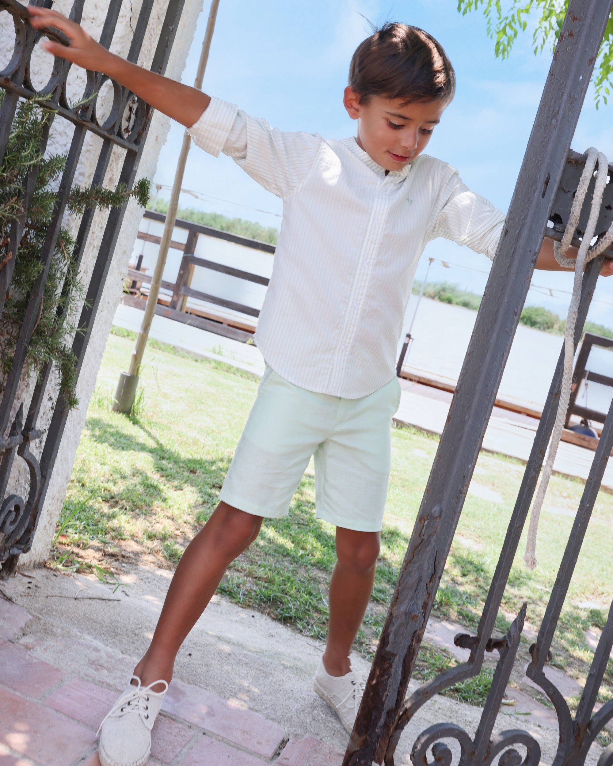 kid having fun in Tutto Piccolo clothes